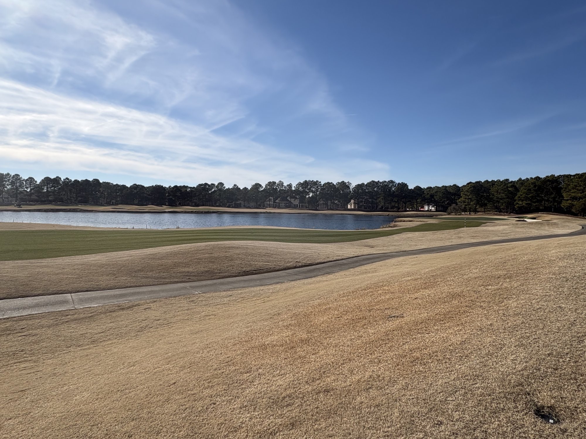 Panoramic view of McKay nine fairway and lake at Thistle Golf Club Sunset Beach NC