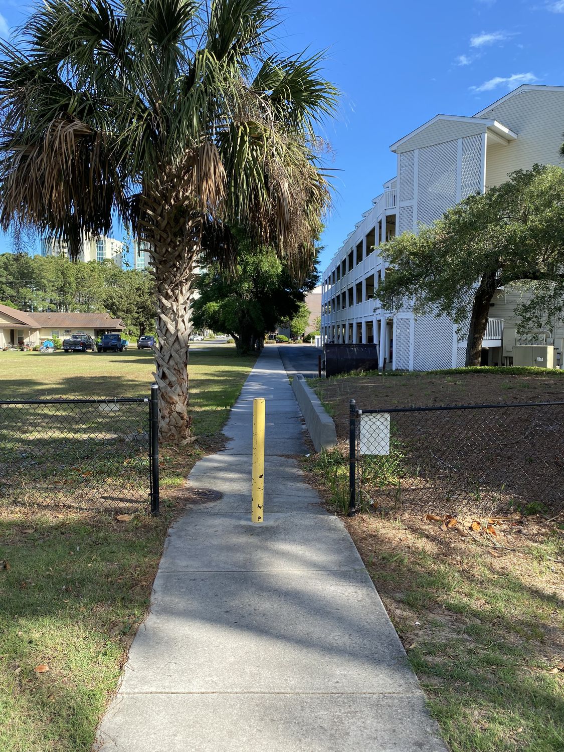 Sidewalk leaving Ocean Keyes walking toward the beach