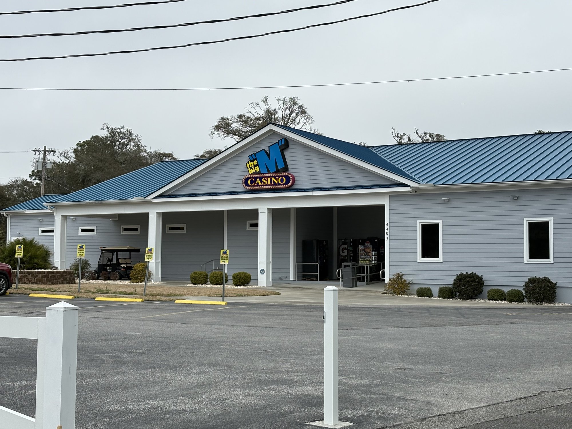 Big M Casino building exterior with blue roof in Little River SC
