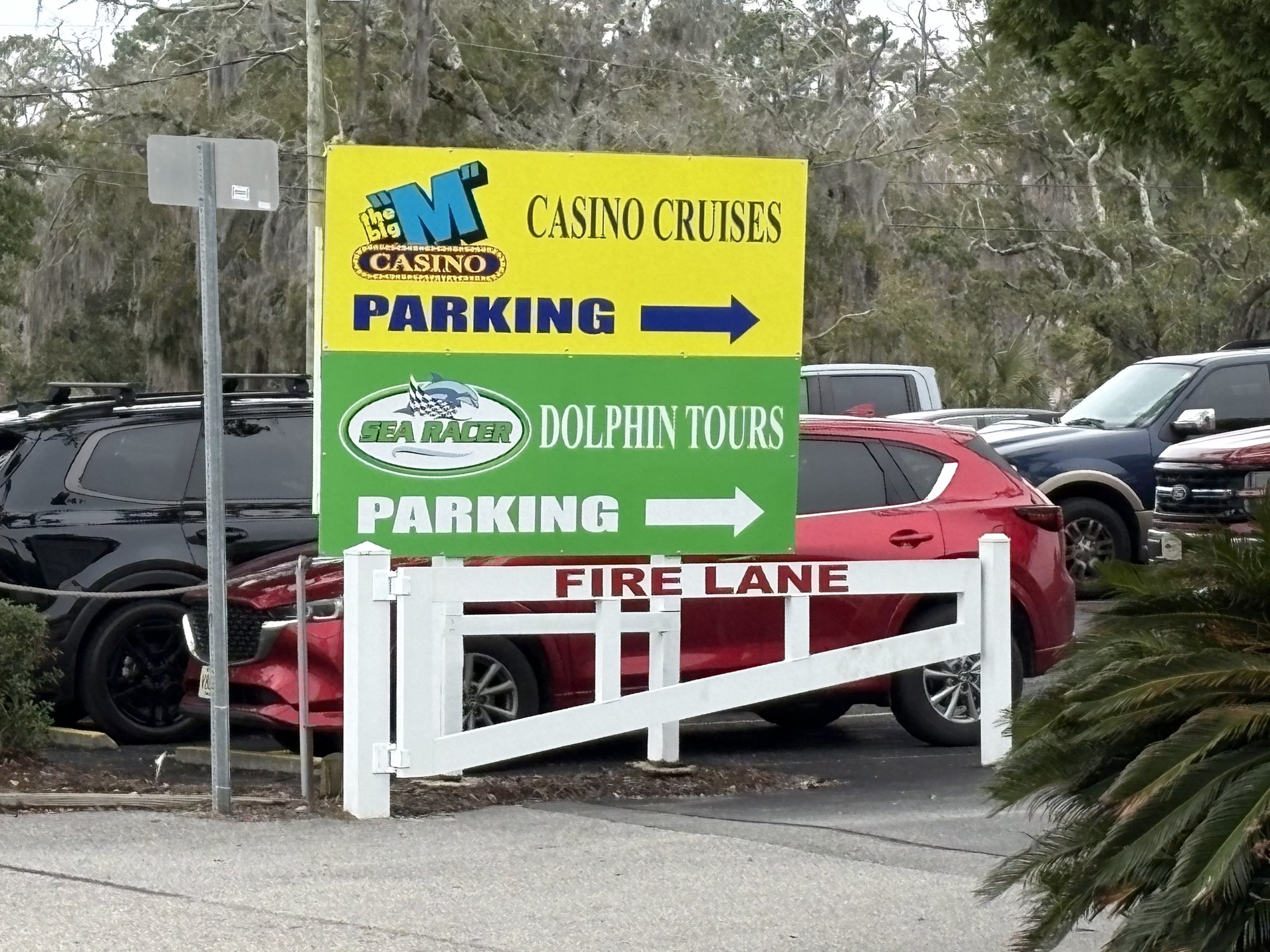 Big M Casino Cruises and Sea Racer Dolphin Tours parking directional sign Little River SC