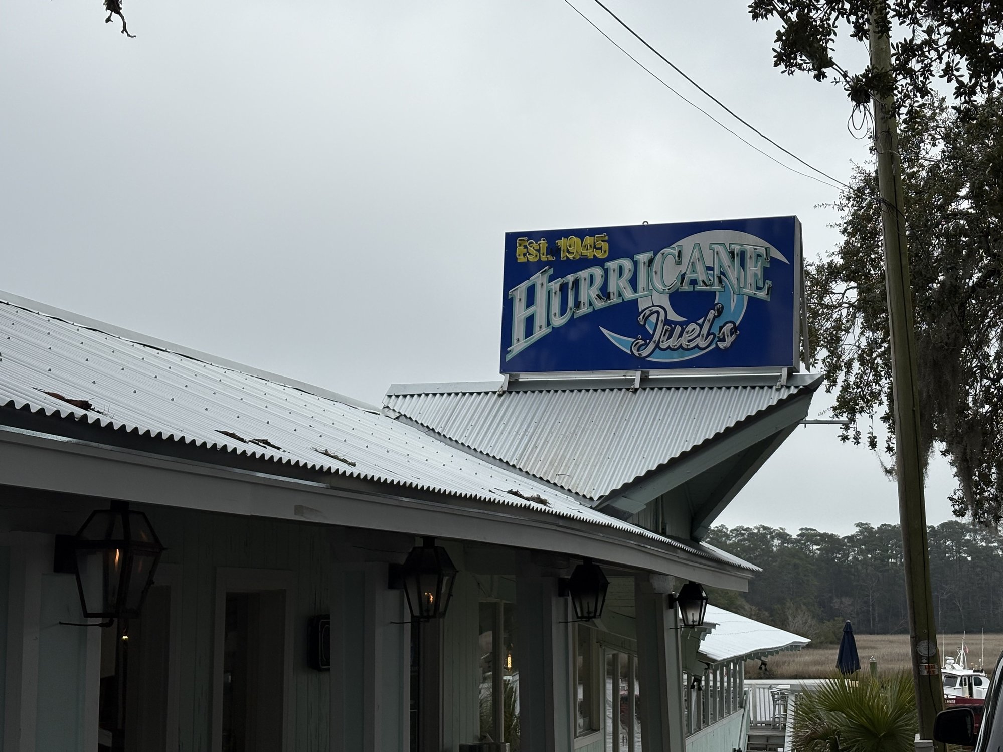 Hurricane Juel's restaurant sign Est 1945 on the Little River waterfront SC