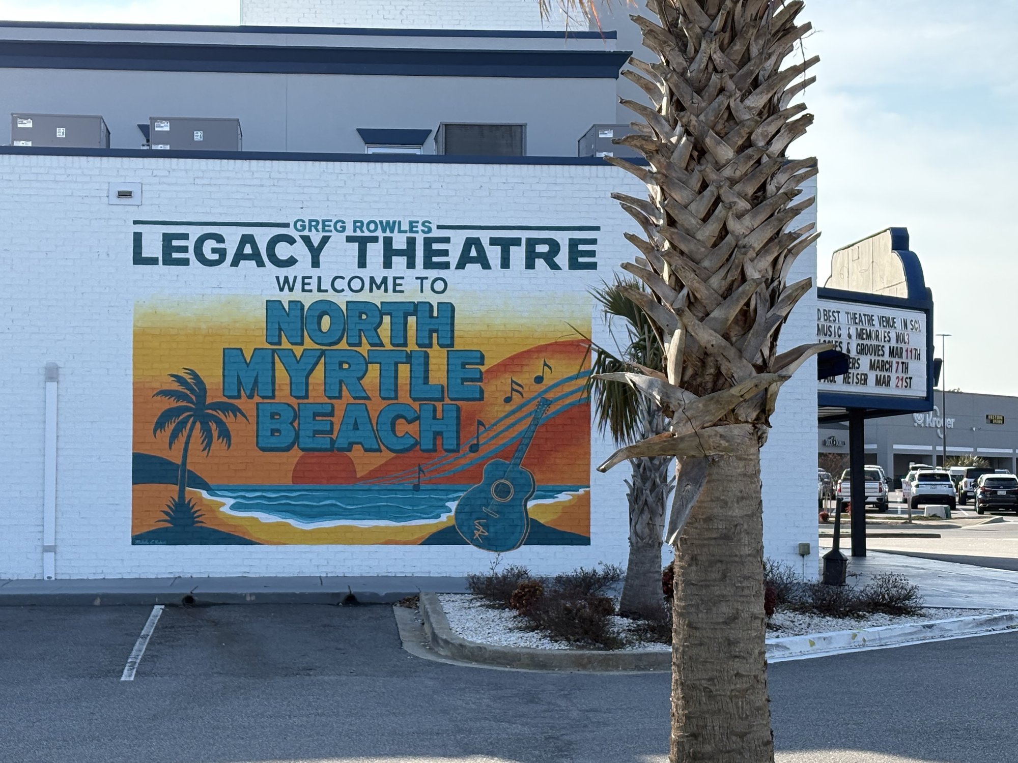 Legacy Theatre Welcome to North Myrtle Beach mural with guitar and palm tree art