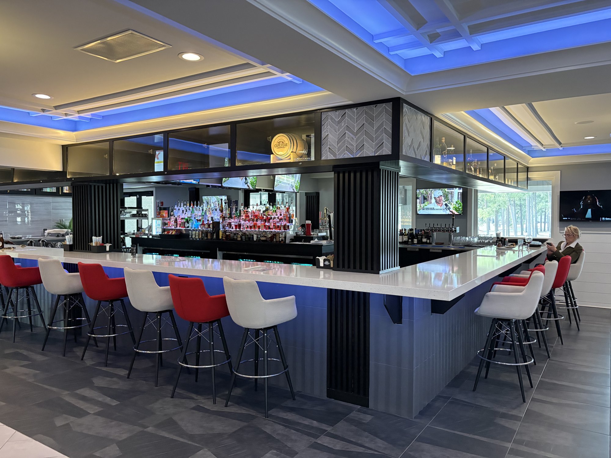 Full bar with blue LED lighting at Sea Trail Golf Resort Sunset Beach NC